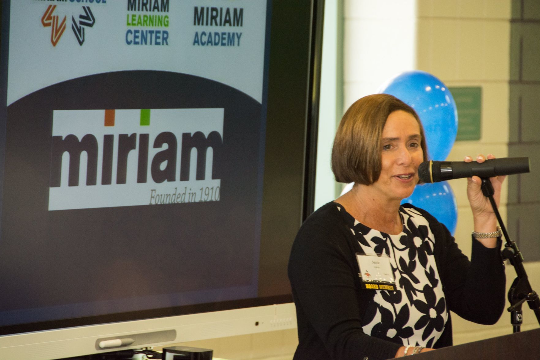 Susie Luten gives the introduction for Barbara Silver at the Friends of Miriam Luncheon